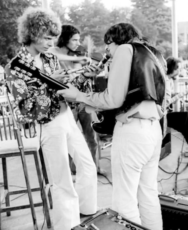 16 David on the bandstand with fellow musicians at the 1969 Free Festival